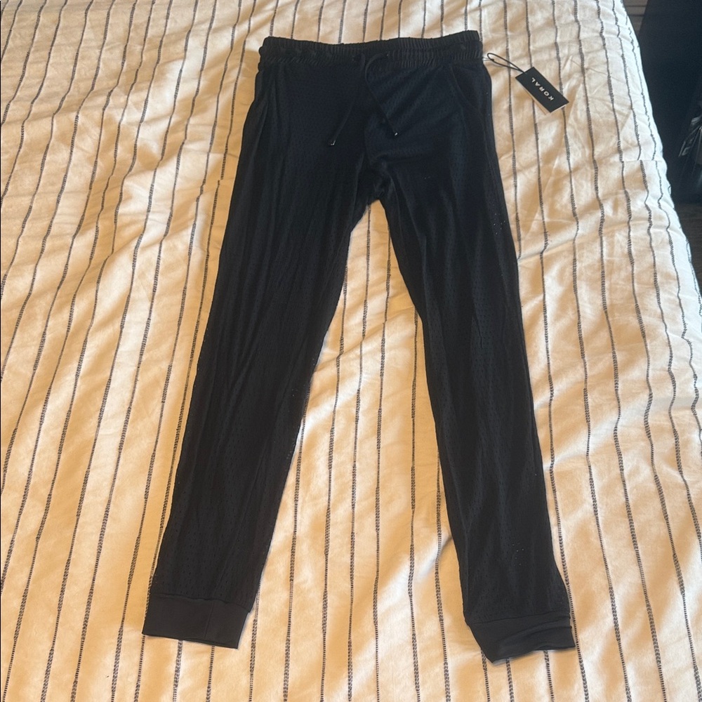 Koral Black Perforated Leggings - Size Small